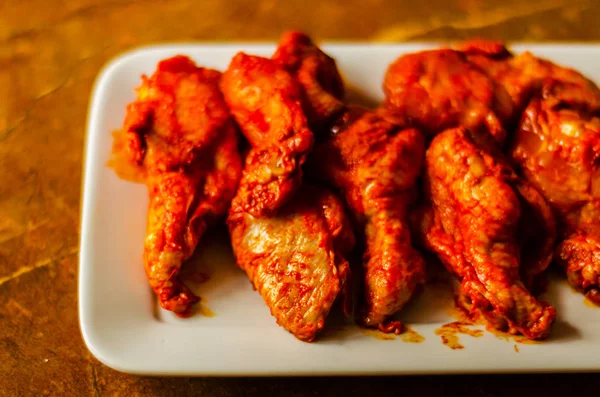 chicken wings marinated in a barbecue sauce, a typical American snack, delicious food