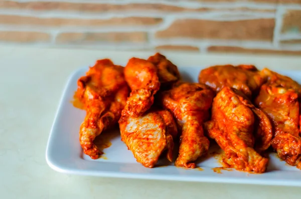 chicken wings marinated in a barbecue sauce, a typical American snack, delicious food