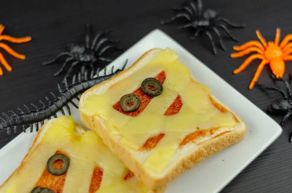 funny sandwiches with mummy for a halloween party, creative serving of food, scary