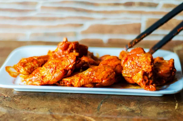 chicken wings marinated in a barbecue sauce, a typical American snack, delicious food