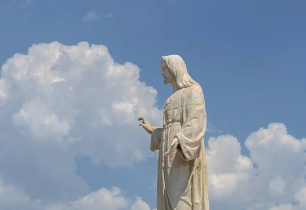 Stock image white statue of Jesus on the hill, place of prayers outside, Christianity