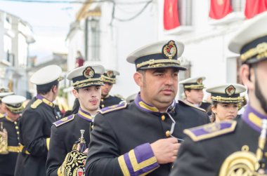 Velez Malaga, İspanya - 25 Mart 2018 insanlar kutsal bir haftada bir İspanyol şehir, Paskalya bağlı alayı katılan