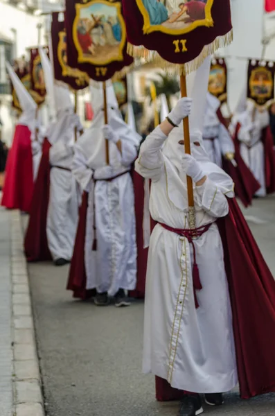 Velez Malaga, İspanya - 25 Mart 2018 insanlar kutsal bir haftada bir İspanyol şehir, Paskalya bağlı alayı katılan