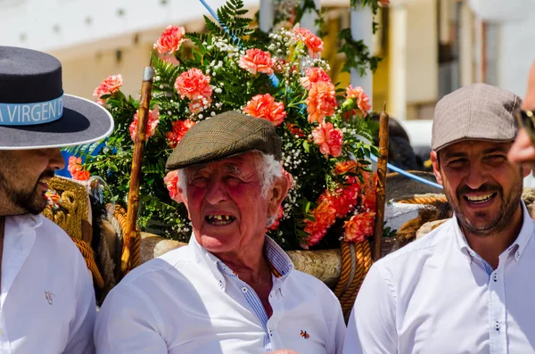 TORRE DEL MAR, SPAIN - APRIL 29, 2018 people participating in the celebration of the Catholic ceremony of transferring the holy figure in Spain