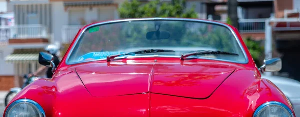 TORRE DEL MAR, SPAIN - JUNE 3, 2018 Old antique cars issued for tourists visiting a seaside town in Spain