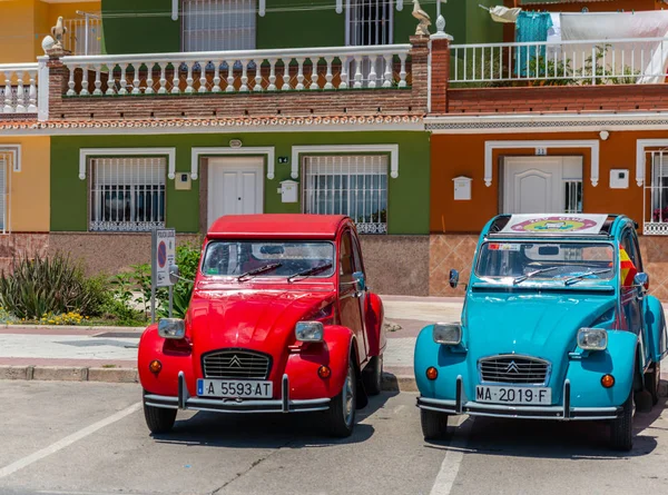 TORRE DEL MAR, SPAIN - JUNE 3, 2018 Old antique cars issued for tourists visiting a seaside town in Spain