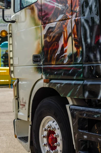 TORROX, SPAIN - JULY 22, 2018 show of tractor units for visitors, powerful machines gathered in a square in an Andalusian town