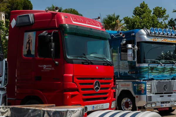 TORROX, SPAIN - JULY 22, 2018 show of tractor units for visitors, powerful machines gathered in a square in an Andalusian town