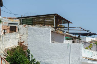 Velez Malaga, İspanya-24 Ağustos 2018 çatılar ve İspanyol şehri binalarda, Güney İspanya'nın karakteristik mimari cephe