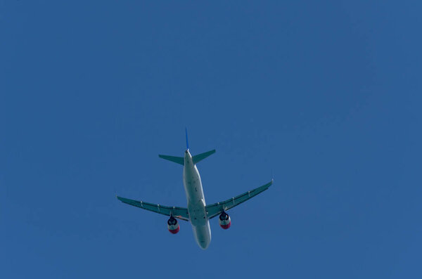MALAGA, SPAIN - MAY 25, 2018 A passenger plane rising up from the Malaga airport, aerospace industry