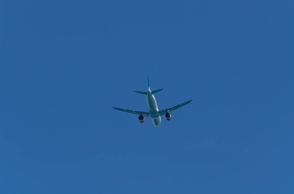 MALAGA, SPAIN - MAY 25, 2018 A passenger plane rising up from the Malaga airport, aerospace industry