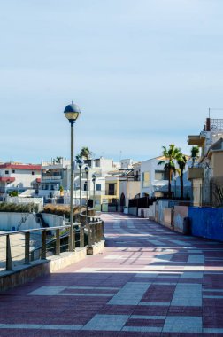 Cabo De Palos, İspanya - 7 Şubat 2019 ünlü promenade ve Akdeniz'de İspanya tarafından kıyı kenti peyzaj