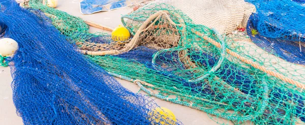 Industrial Fishing Equipment Fishnets and Fishing Lines lying on — Stock Photo, Image