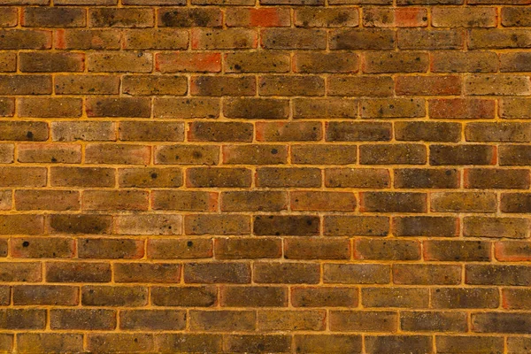 Stará cihlová zeď umístěná ve stěně, zajímavá a originální backgroun — Stock fotografie