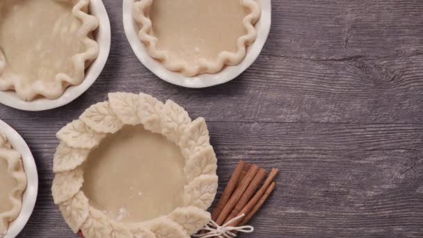 Preparing Pie Crusts Mini Pumpkin Pies — Stock Video