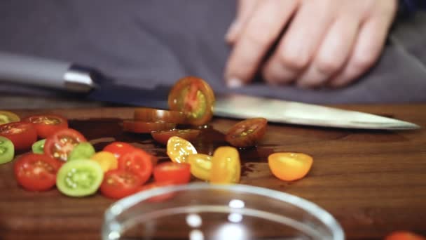 Slicing Heirloom Cherry Tomatoes Wood Cutting Board — Stock Video