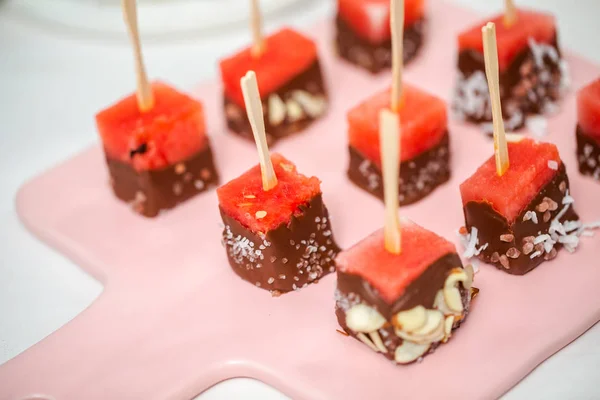 Preparing Watermelon Appetizers Dipped Chocolate Sprinked Sea Salt Almonds — Stock Photo, Image