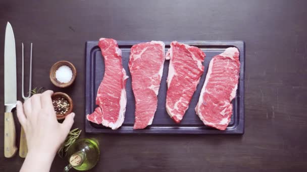 Raw New York Strip Steaks Cast Iron Frying Pan — Stock Video