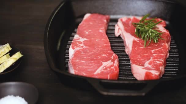 Raw New York Strip Steaks Cast Iron Frying Pan — Stock Video