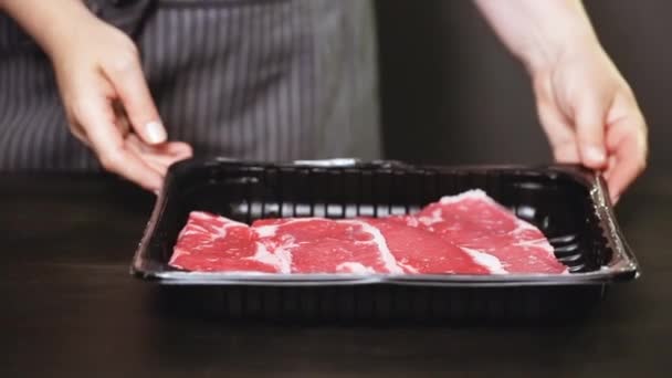 Raw New York Strip Steaks — Stock Video