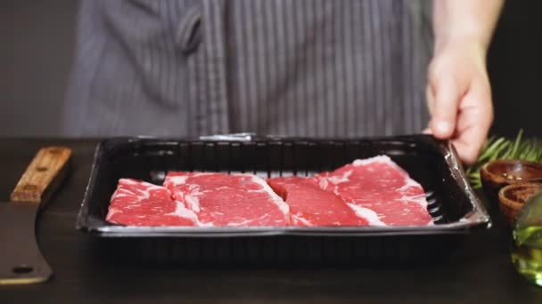 Raw New York Strip Steaks — Stock Video