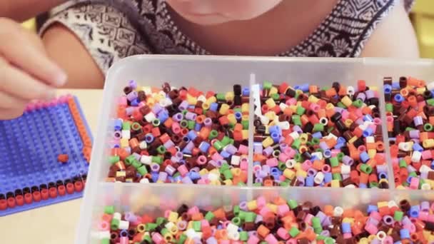 Little Girl Making Bracelet Colorful Kids Beads — Stock Video