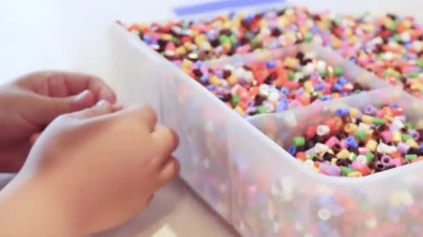 Little Girl Making Bracelet Colorful Kids Beads — Stock Video