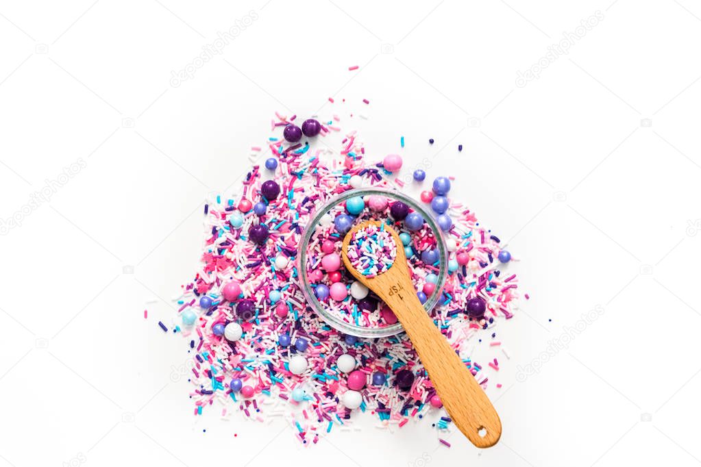 Colorful purple sprinkle blend on a white background.