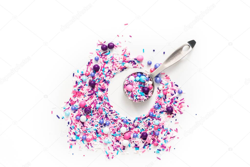 Colorful purple sprinkle blend on a white background.