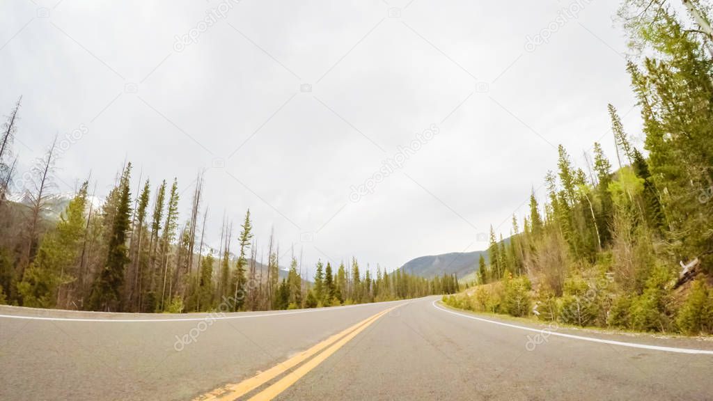 Driving on mountain highway 40 over Berthoud Pass in the Summer.