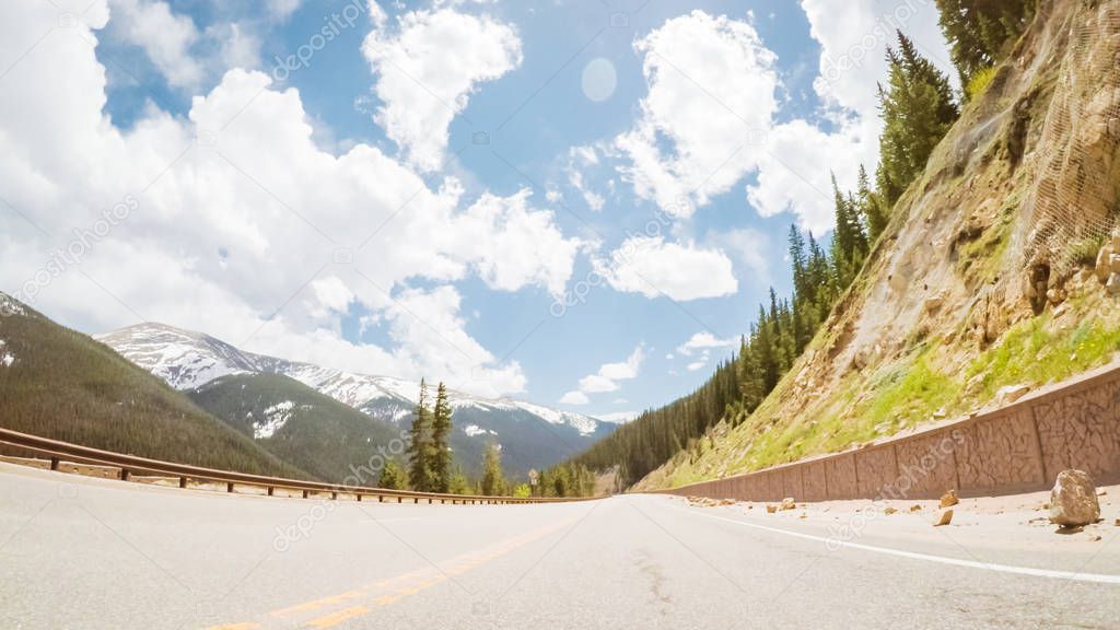 Driving on mountain highway 40 over Berthoud Pass in the Summer.