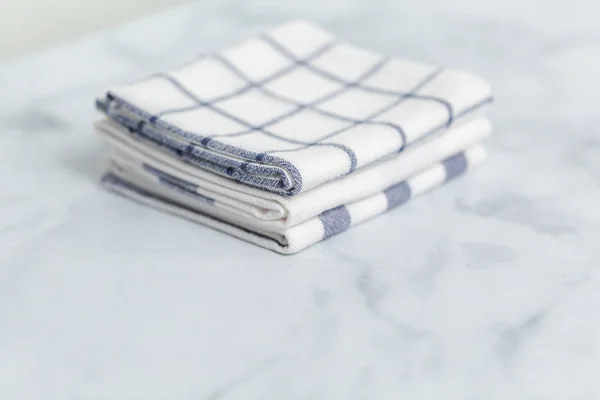 New Kitchen Towels Simple Blue Pattern Folded Marble Counter — Stock Photo, Image