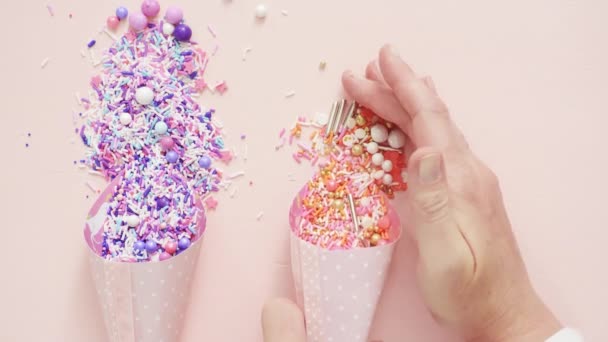 Colorful Sprinkle Blend Pink Background — Stock Video