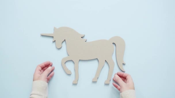 Unfinished Unicorn Cut Out Blue Background — Stock Video