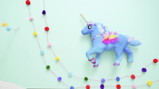 Kids Craft Painted Blue Decorated Jewels Feathers Paper Mache Unicorn — Stock Video