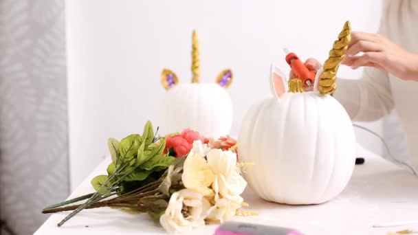 Woman Gluing Horn Ears Craft Pumpkin Make Unicorn Theme Halloween — Stock Video