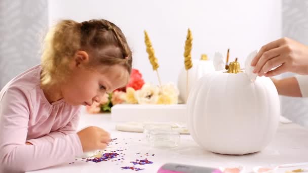 Gluing Horn Ears Pumpkin Mother Daughter Decorating Craft Pumpkins Unicorn — Stock Video