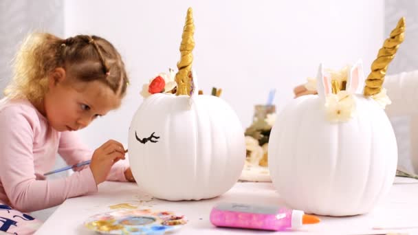 Mother Daughter Painting Face Unicorn Decorating Craft Pumpkins Flowers Make — Stock Video
