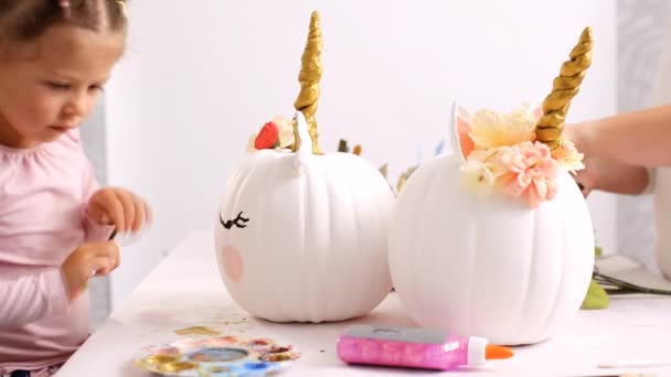 Mother Daughter Painting Face Unicorn Decorating Craft Pumpkins Flowers Make — Stock Video