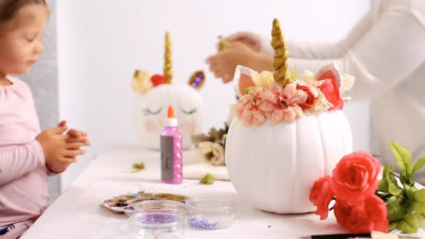 Mother Daughter Painting Face Unicorn Decorating Craft Pumpkins Flowers Make — Stock Video