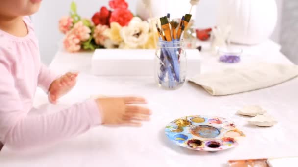 Mother Daughter Painting Gold Paint Clay Sculpted Horn Ears Decorating — Stock Video