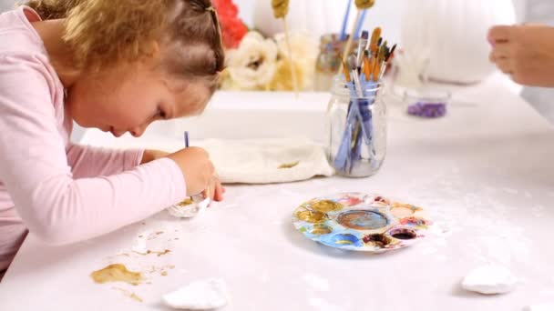 Mother Daughter Painting Gold Paint Clay Sculpted Horn Ears Decorating — Stock Video