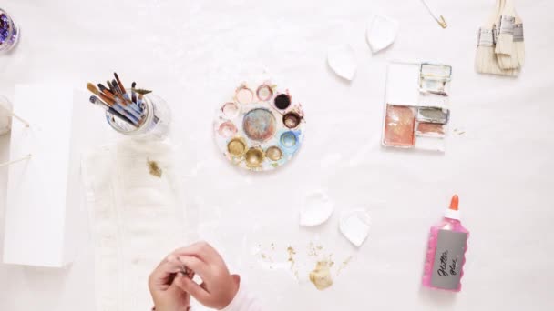 Mother Daughter Painting Gold Paint Clay Sculpted Horn Ears Decorating — Stock Video