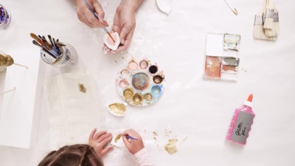 Mother Daughter Painting Gold Paint Clay Sculpted Horn Ears Decorating — Stock Video