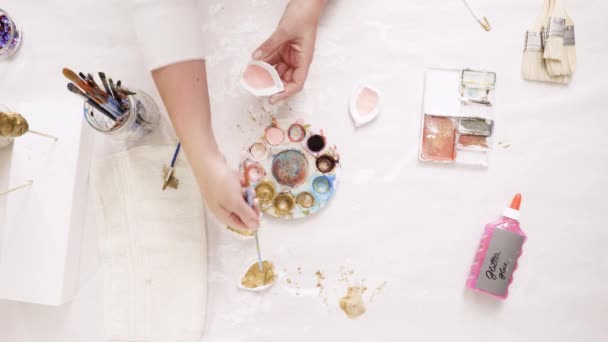 Mother Daughter Painting Gold Paint Clay Sculpted Horn Ears Decorating — Stock Video