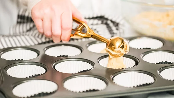 Scooping Cupcake Batter With Dough Scoop Into A Baking Pan With Liners To  Bake American Flag Mini Cupcakes. Stock Photo, Picture and Royalty Free  Image. Image 191046254.