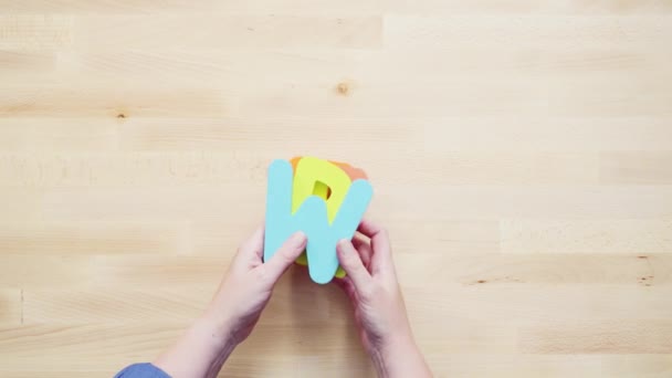 Word Write Multicolor Wooden Letters Wooden Table — Stock Video