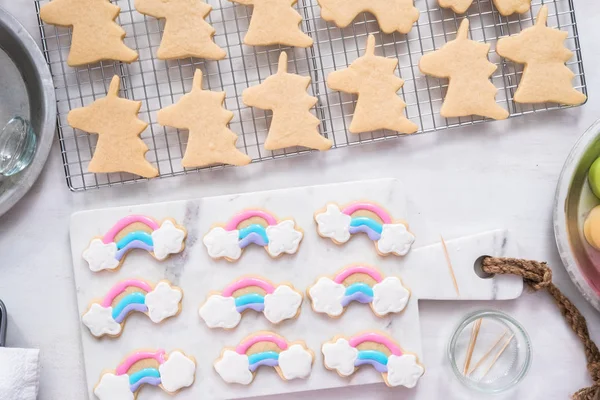 Decorating Unicorn Themed Sugar Cookies Royal Icing — Stock Photo, Image