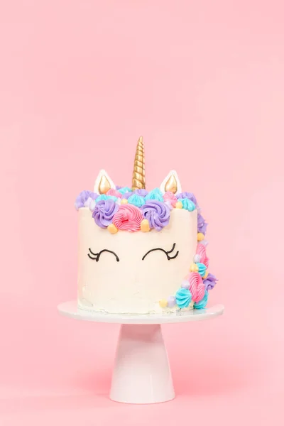 Unicorn cake decorated with multicolor buttercream icing.