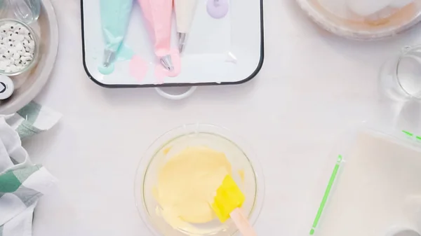 Mixing Food Coloring Royal Icing Decorate Unicorn Sugar Cookies — Stock Photo, Image